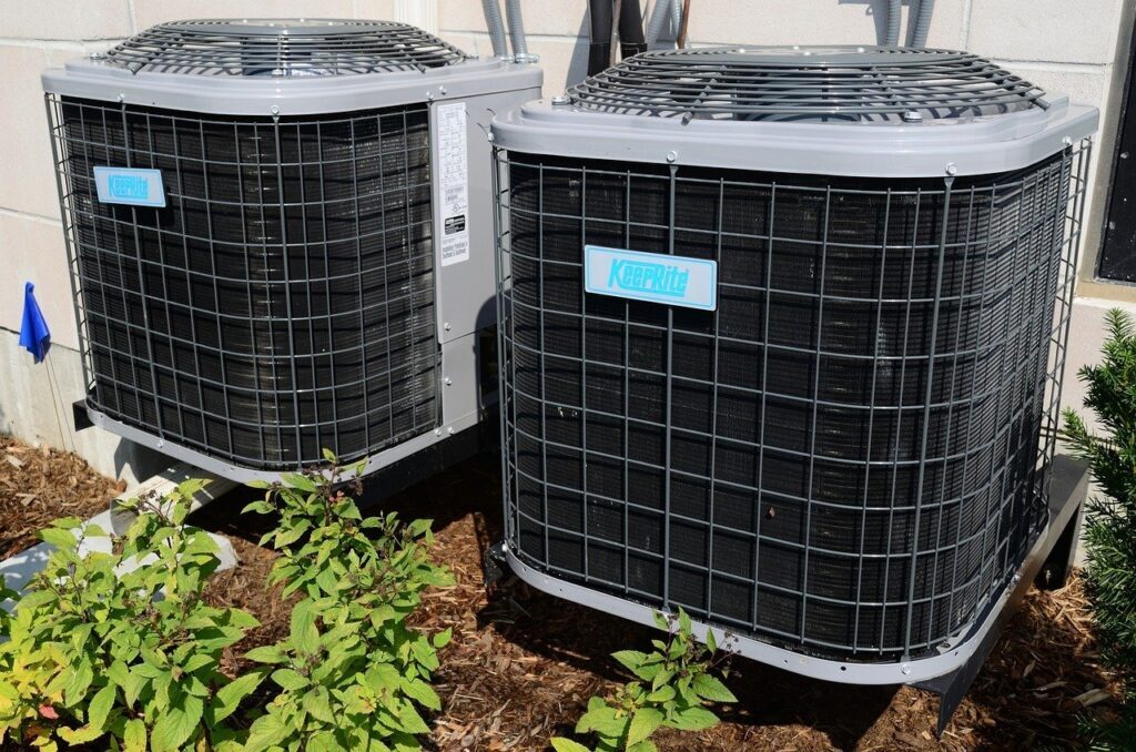 Two AC condenser units side by side